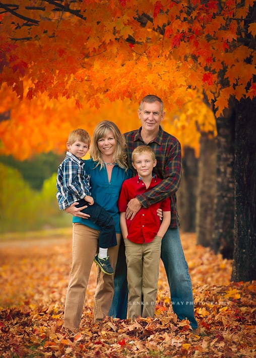 A lovely fall image of a family taken at the Asheville Arboretum.
