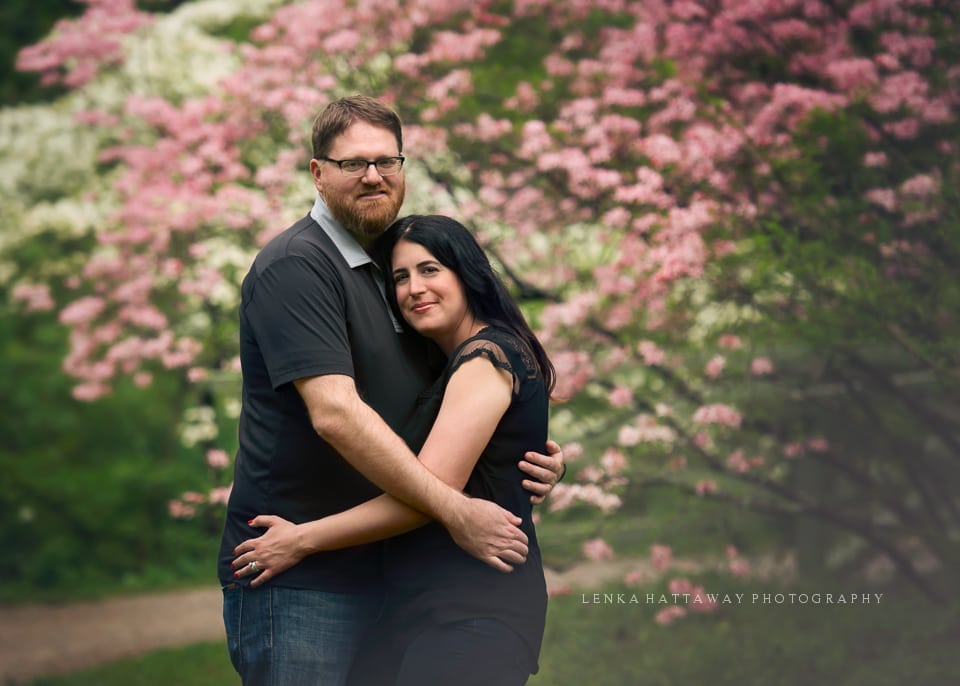A professional image of a couple holding each other.
