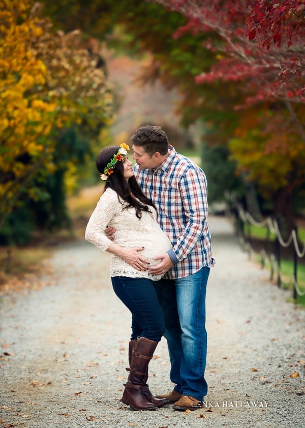A beautiful professional shot from the Asheville Arboretum of a couple expecting a baby.