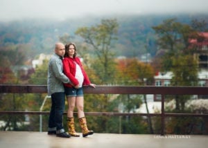 A photo of a couple from downtown Asheville. Maternity session.