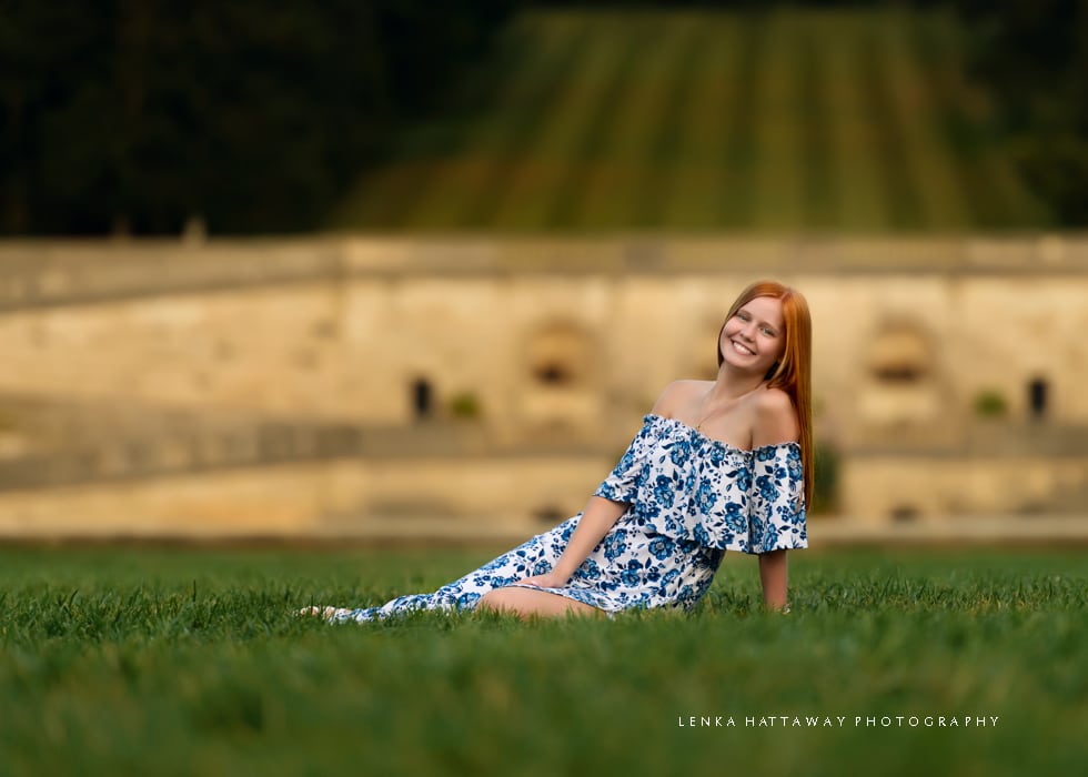 A beautiful senior photographed on the lawn of Biltmore Estate.