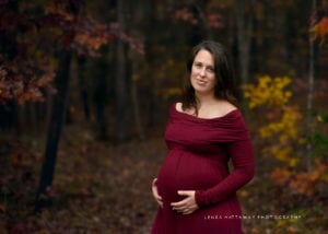 An expecting mom during an outdoor family/ maternity at the Asheville Arboretum.