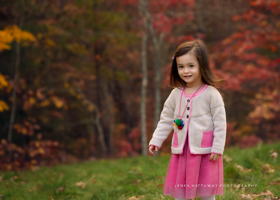 A sweet girl in pink dress photographed at the Asheville Arboretum.
