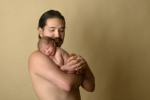 Father holding his baby boy.