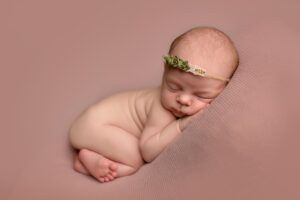 Newborn photo of a baby girl.