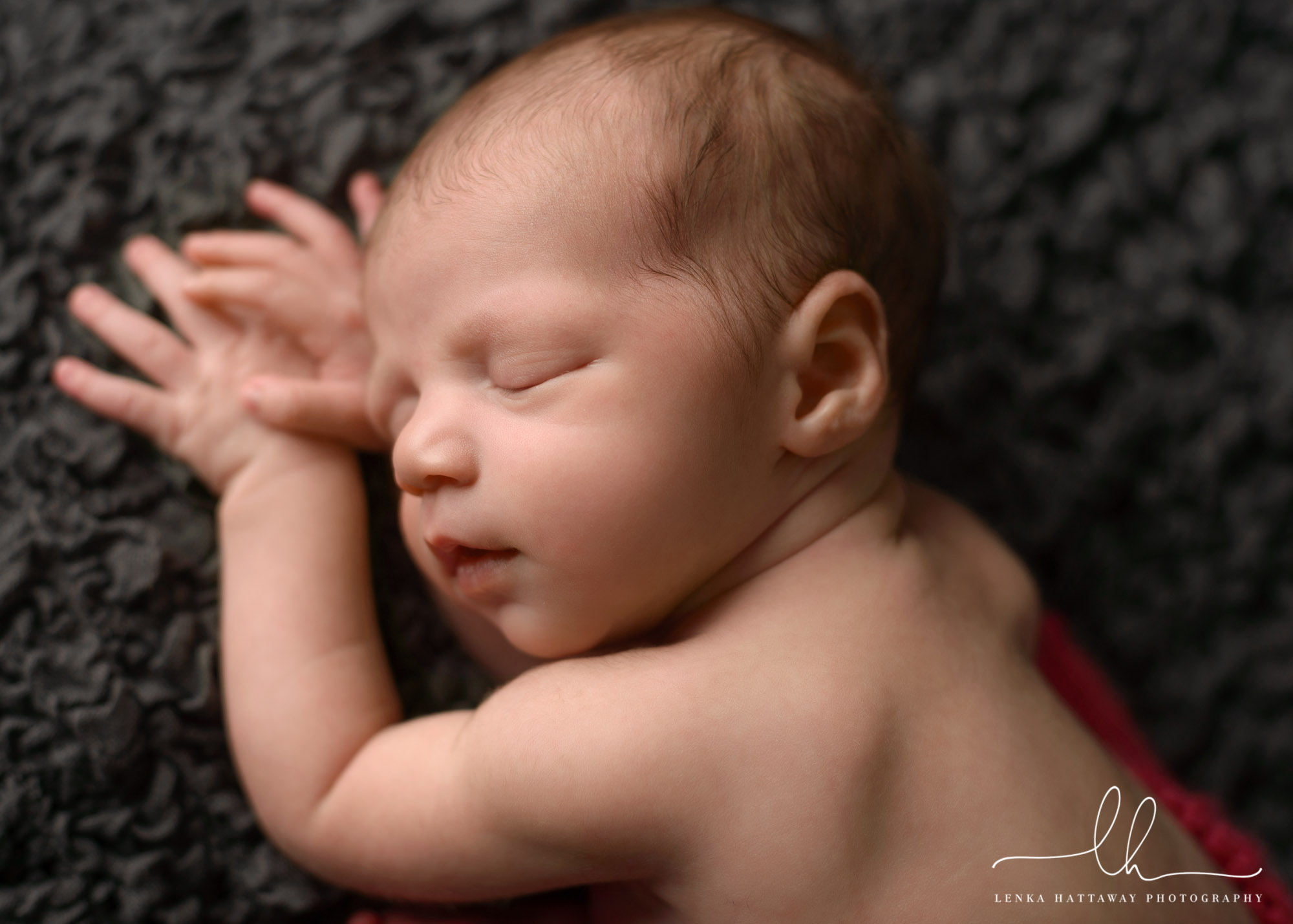 A close-up photo of a newborn baby.