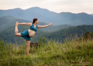 Maternity photo of a pregnant mom-to-be dong yoga by Asheville maternity photographer, Lenka Hattaway.
