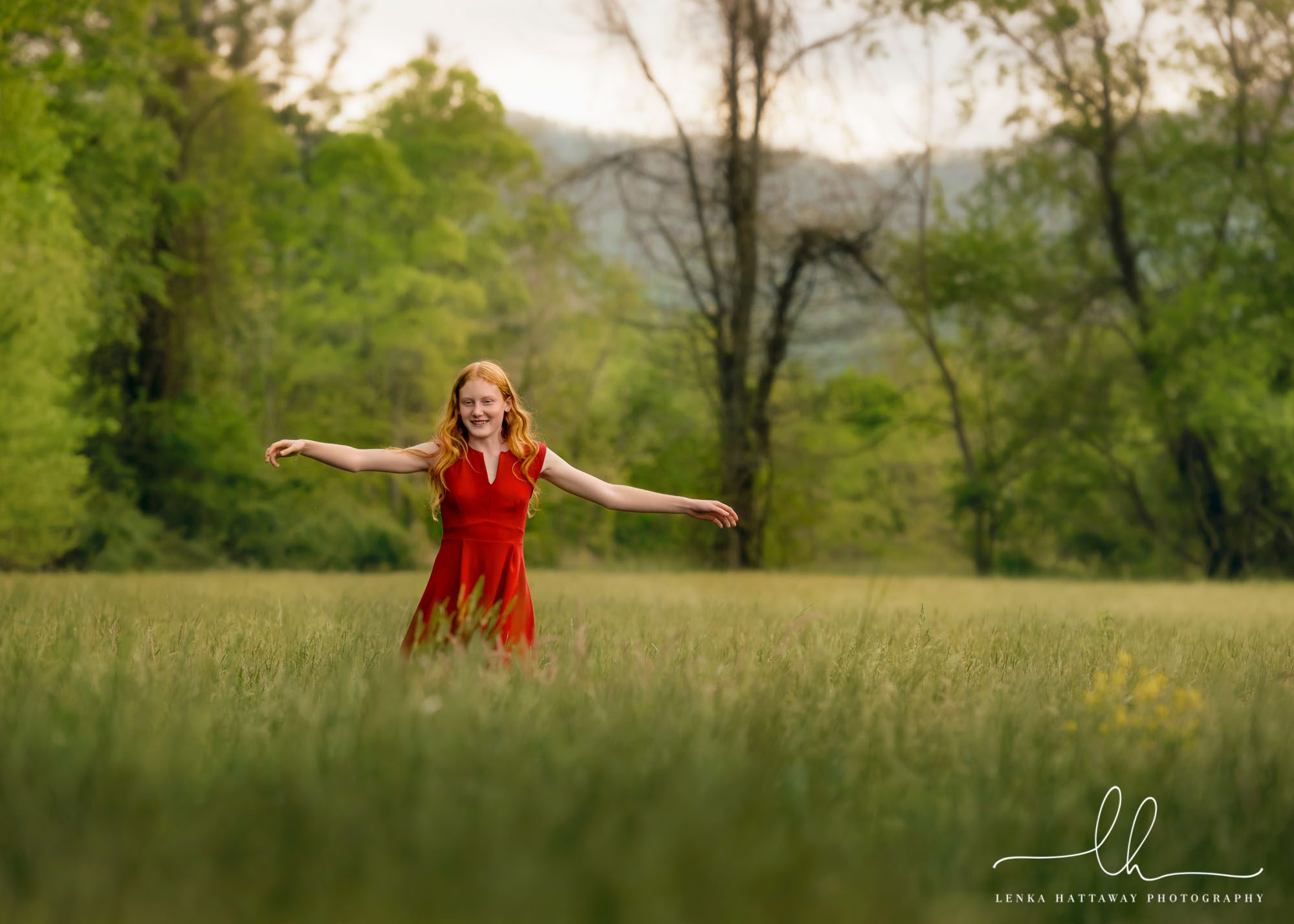 Girl dancing during a backyard mother-daughter photo session.