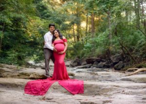Maternity photography on a creek in the Asheville Botanical Gardens.