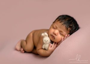 Newborn baby photography of a baby with bunny.