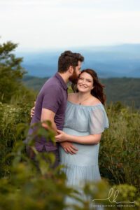 Beautiful pregnancy mountain photo of a couple.