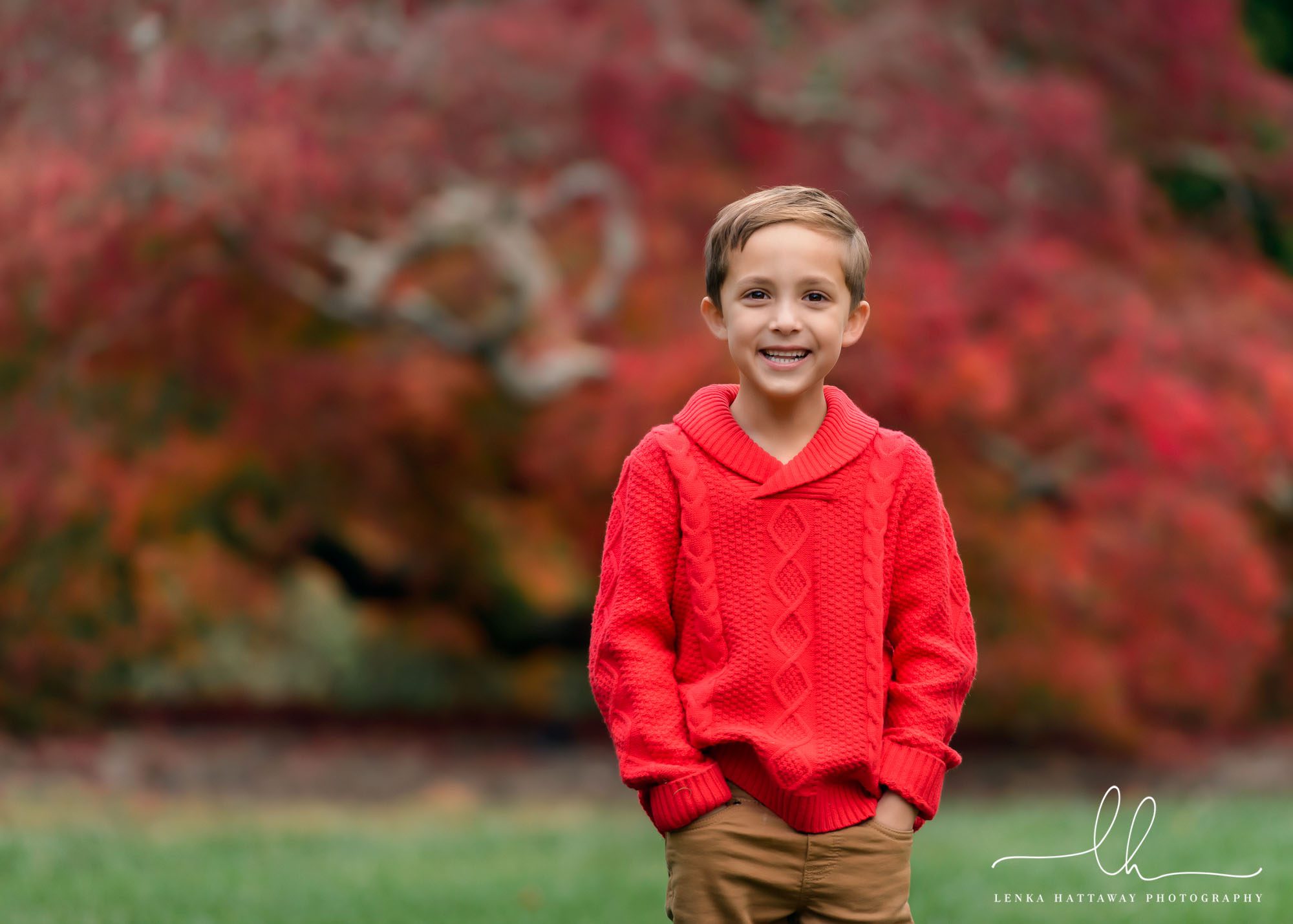 Sweet smiling boy photo with beautiful fall colors.