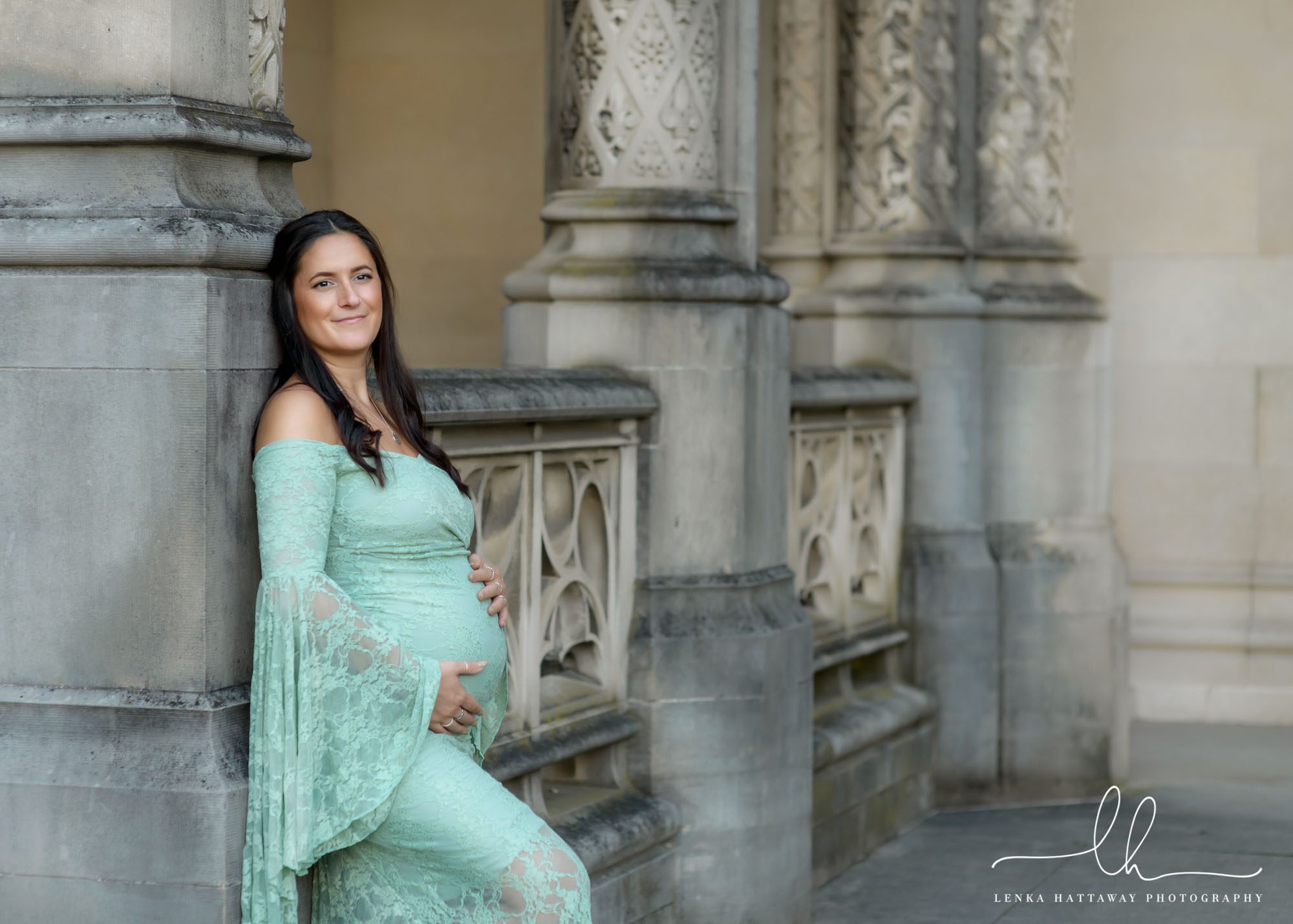 Expecting mom photo next to the architecture of the Biltmore house.